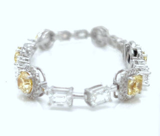 Natural Mined Cushion Cut Fancy Yellow Diamond with Natural Mind Emerald Cut Diamond Link Bracelet White Gold GIA Certified