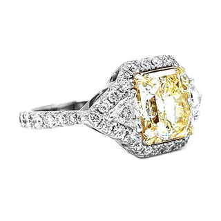 Natural Mined Radiant Cut Fancy Yellow with Triangle Cut Diamond Halo Ring GIA Certified