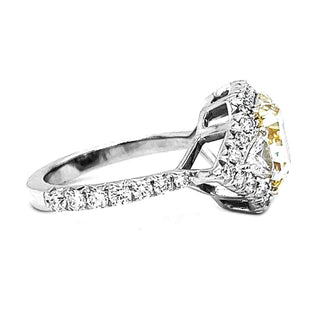 Natural Mined Radiant Cut Fancy Yellow with Triangle Cut Diamond Halo Ring GIA Certified