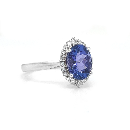 Natural Oval Tanzanite and Natural Mined Round Diamond Halo Floral White Gold Ring