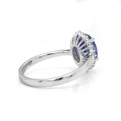 Natural Oval Tanzanite and Natural Mined Round Diamond Halo Floral White Gold Ring